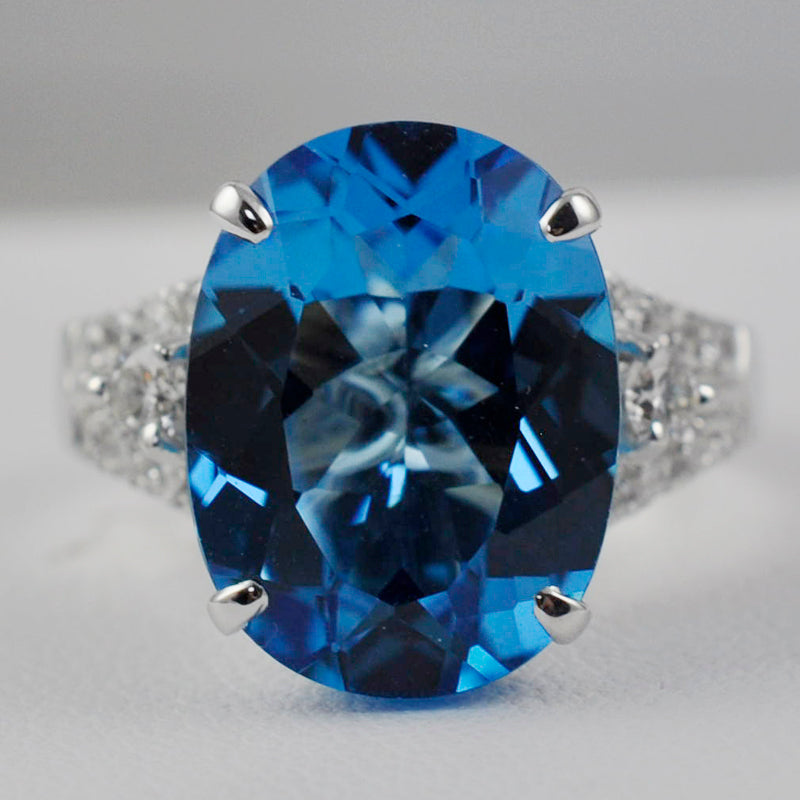 Blue Topaz and Diamonds Ring